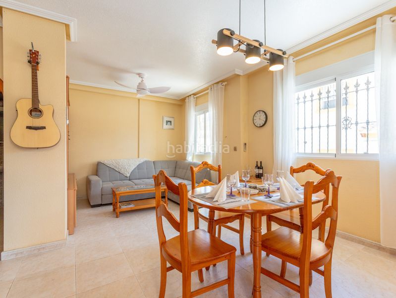 Foto da57c246-6907-4eaa-9b51-e1bbc7a115fe. Casa aparellada amb piscina a Playa Flamenca Orihuela