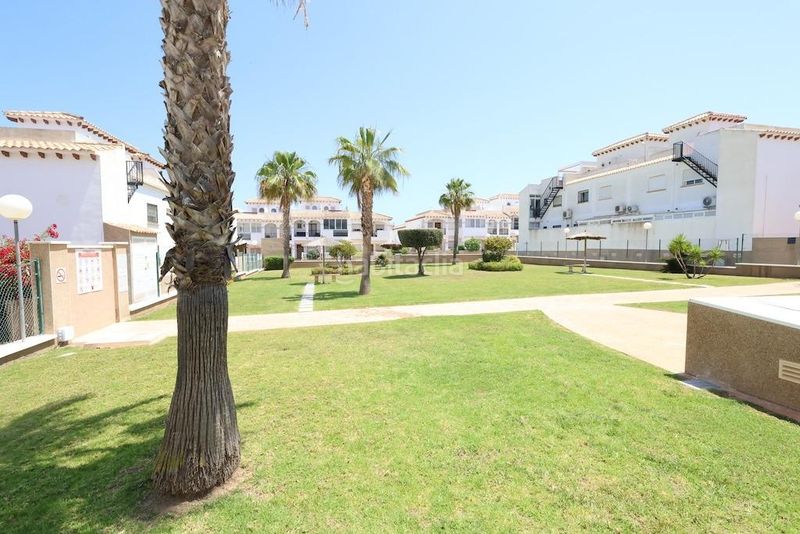 Foto 513b393c-fdde-4c23-b538-88c71e8aa698. Casa adossada amb piscina a Los Balcones y los Altos Orihuela
