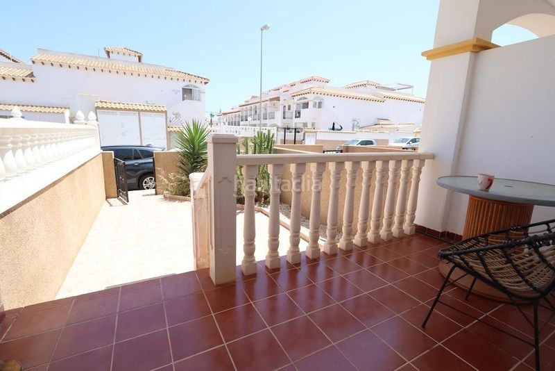 Foto 550a0df3-fba7-466c-9585-f4d400d45571. Casa adossada amb piscina a Los Balcones y los Altos Orihuela