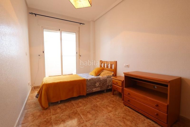 Foto c1b85e5e-ece9-4b13-852b-e1c2bed30970. Casa adossada amb piscina a Los Balcones y los Altos Orihuela