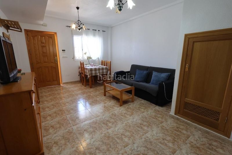 Foto e402ee55-3e74-474c-ab42-71f3c9f20c66. Casa adossada amb piscina a Los Balcones y los Altos Orihuela