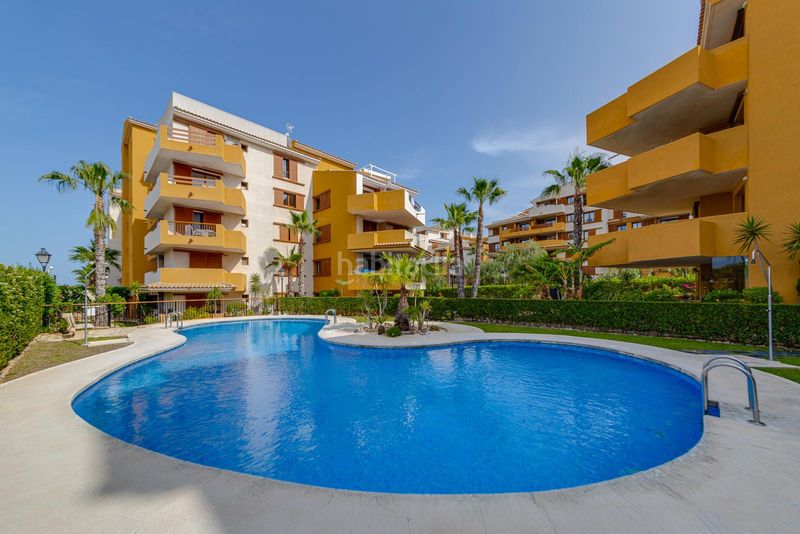 Foto 1d09f638-6474-41d0-aebd-b875fb57bc12. Apartament amb piscina a Punta Prima Torrevieja