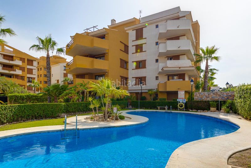 Foto fde40af9-a1c9-478f-a4b6-216d5a5c619b. Apartament amb piscina a Punta Prima Torrevieja
