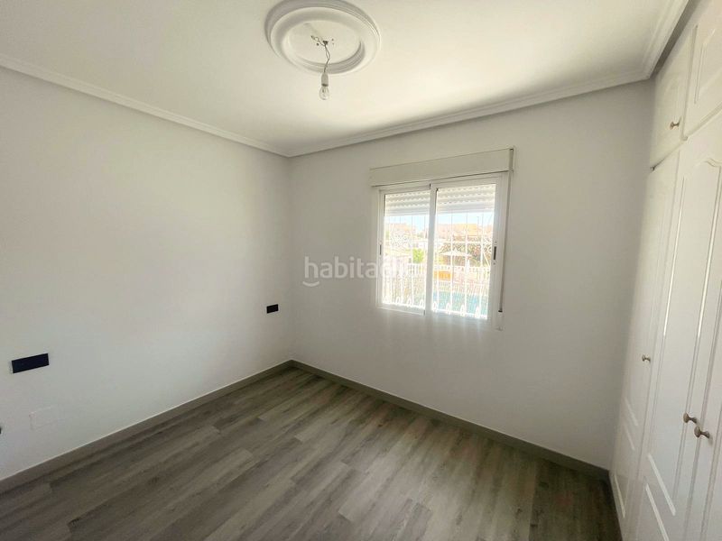 Foto 5f06f8fa-55d9-453a-81ff-5dc8014deae5. Casa aparellada amb piscina a Rojales
