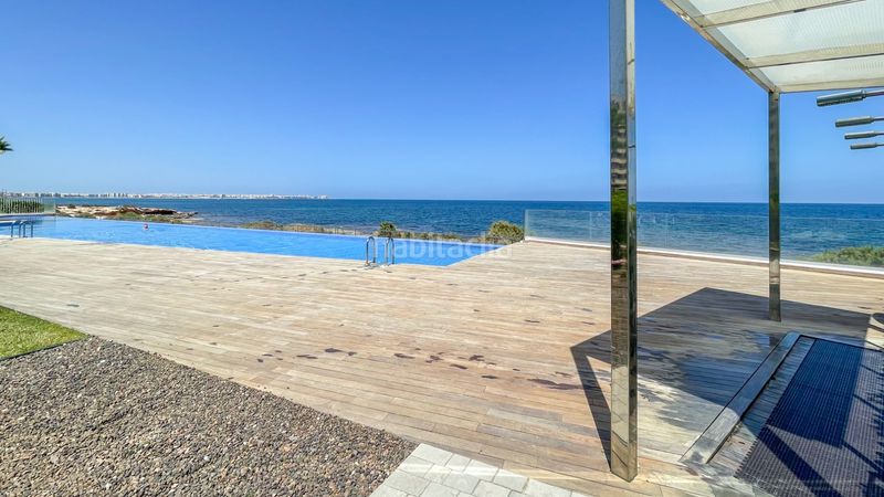 Foto f1634766-f4ca-489a-99b8-2d7aa381a7d9. Apartament amb piscina a Punta Prima Torrevieja