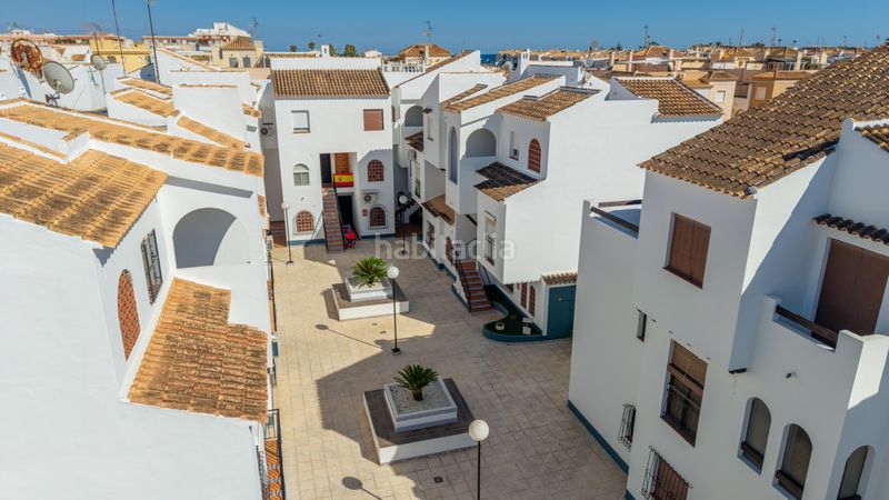 Foto 1752680b-69f4-4dd6-866a-7f27cbdcb0b7. Planta baixa amb piscina a Playa de los Náufragos Torrevieja