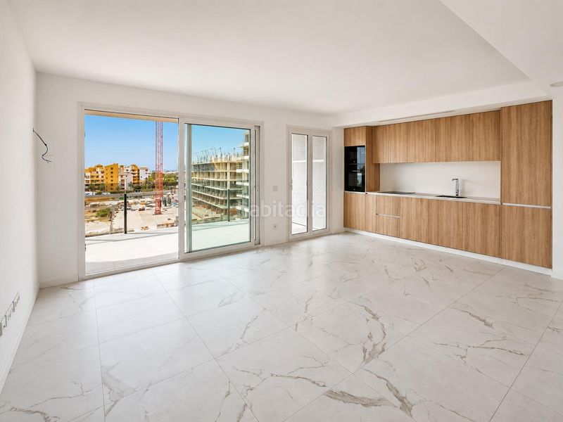 Foto 98f2c6fd-cf1b-4686-8a2f-4607c92ec828. Apartament amb aparcament piscina a Punta Prima Torrevieja
