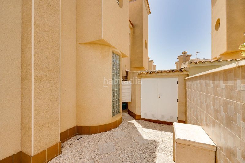 Foto 103c511e-14f4-4442-bb05-d16962aae00e. Casa aparellada amb piscina a Playa Flamenca Orihuela