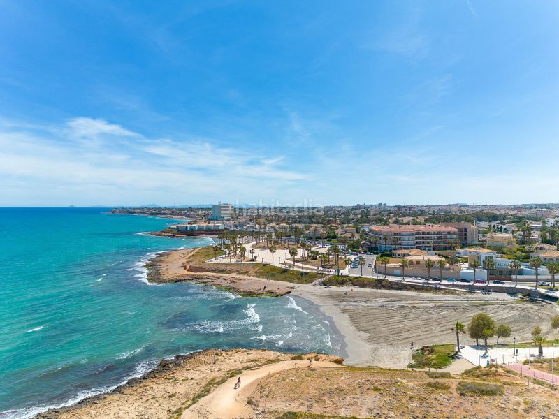 Foto 6a814486-82bc-4343-b1d2-fd50c13cf16a. Casa aparellada amb piscina a Playa Flamenca Orihuela