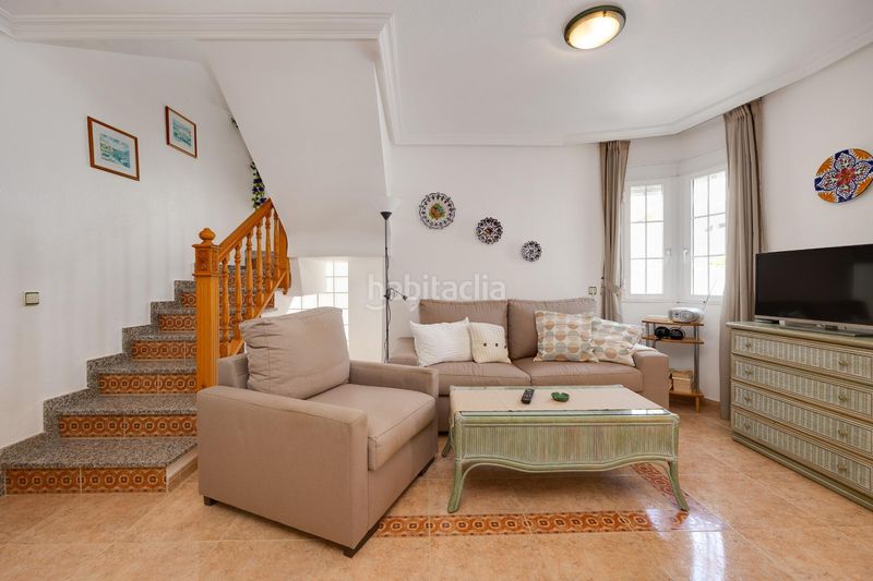 Foto b21a14ac-456e-4826-beb3-5c66c7d69ced. Casa aparellada amb piscina a Playa Flamenca Orihuela