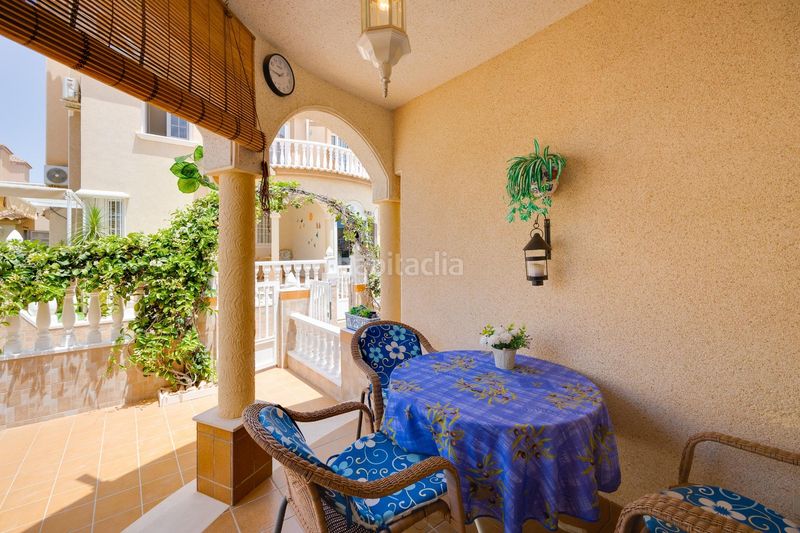 Foto e028453e-58c3-42b2-abb1-623190b3341a. Casa aparellada amb piscina a Playa Flamenca Orihuela