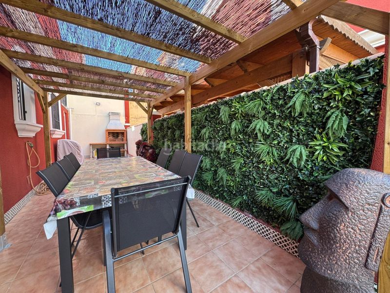 Foto f37e6211-e2f9-40be-a0fe-0e32bc4b00b6. Casa aparellada amb piscina a Los Almendros Orihuela