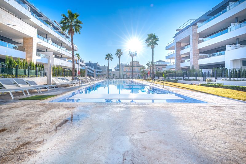 Foto 82f4a3c1-9caf-48b1-82e0-8c6c496c9694. Apartament amb aparcament piscina a Playa Flamenca Orihuela