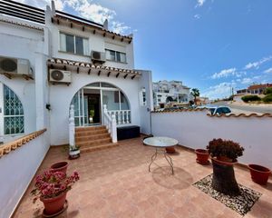 Doppelhaus in Rojales Hills - Rosa Bungalows. Adosado con solaacuterium, piscina comunitaria y preciosos jardi