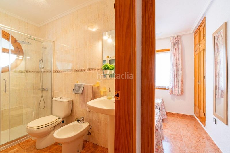 Foto 029c5fcd-9b9a-4892-9172-75db67b54536. Casa aparellada amb piscina a Playa Flamenca Orihuela
