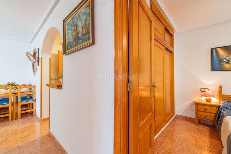 Foto 53bd6289-a413-4d31-be58-b35e5eb4bf20. Casa aparellada amb piscina a Playa Flamenca Orihuela