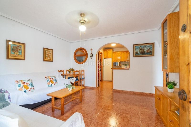 Foto b5bffdbf-9c52-4c78-870c-b66f892c8be1. Casa aparellada amb piscina a Playa Flamenca Orihuela