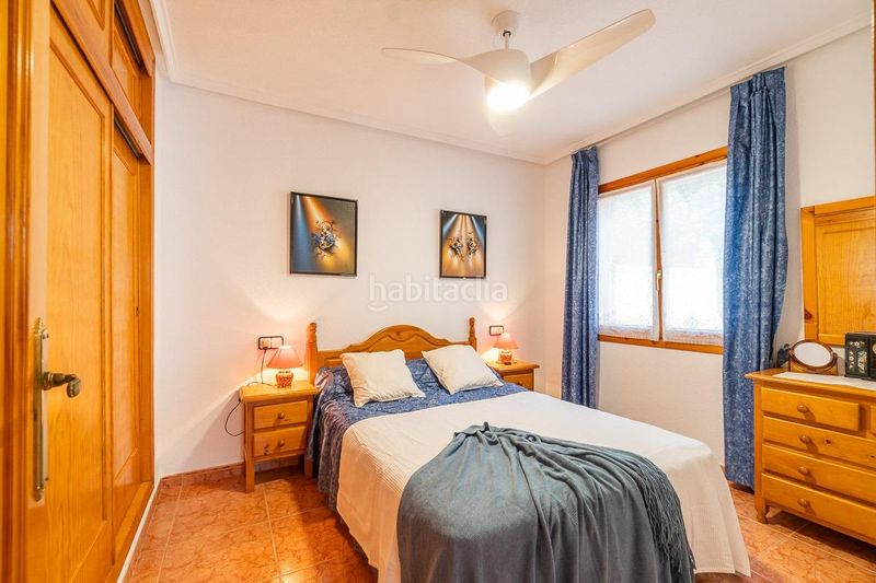 Foto c9755a83-c2c9-4f9d-b1b3-b5b7b92ea9d4. Casa aparellada amb piscina a Playa Flamenca Orihuela