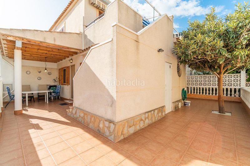 Foto cf9937b7-dce8-4710-81f5-285e255564d9. Casa aparellada amb piscina a Playa Flamenca Orihuela