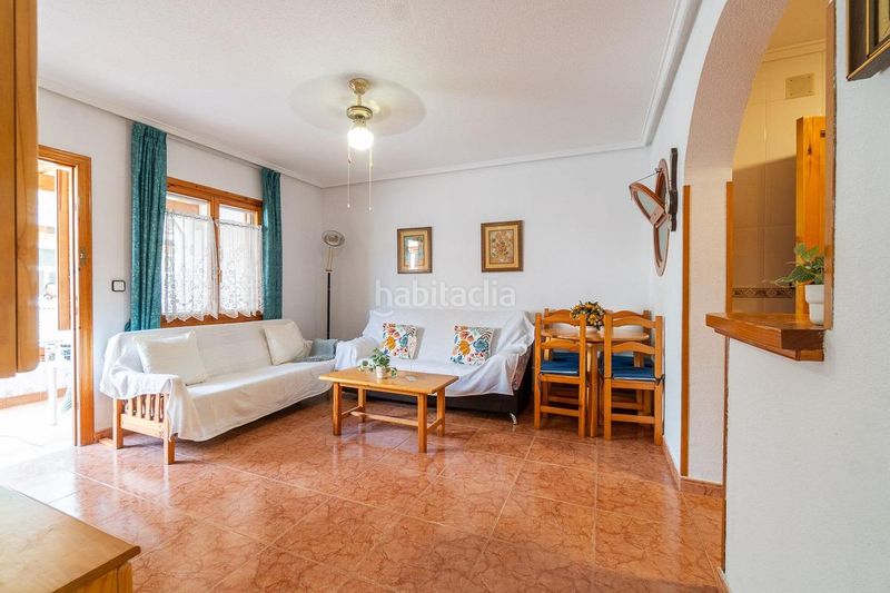 Foto dc61a435-ee70-417e-92a5-4210de5ad161. Casa aparellada amb piscina a Playa Flamenca Orihuela