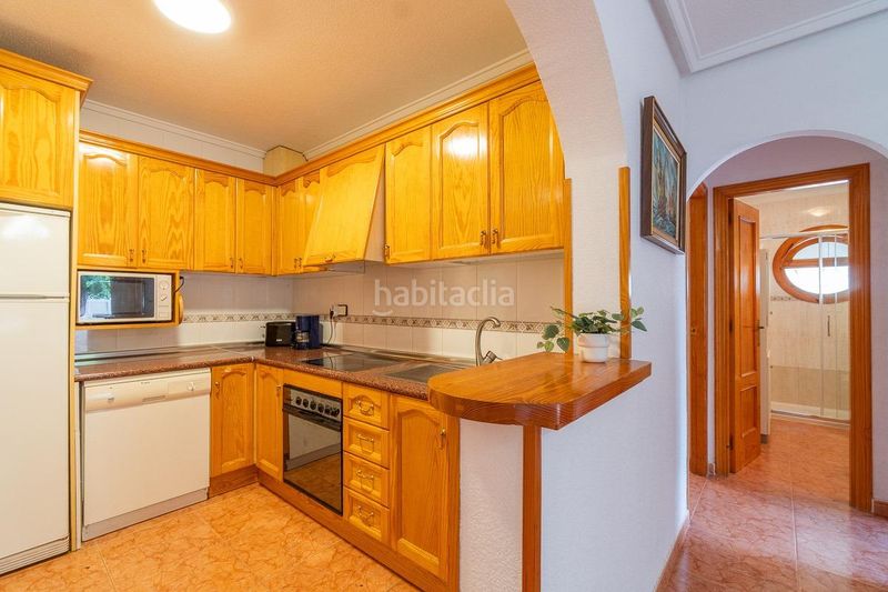Foto e918842d-87fd-4e7f-94f1-b549f974e916. Casa aparellada amb piscina a Playa Flamenca Orihuela