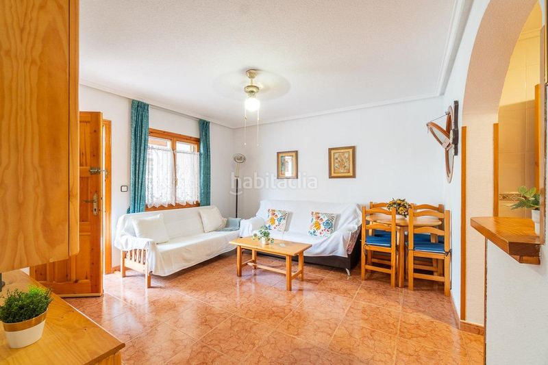 Foto ee85ed87-98bd-422a-94d0-71cb3cff4b9c. Casa aparellada amb piscina a Playa Flamenca Orihuela