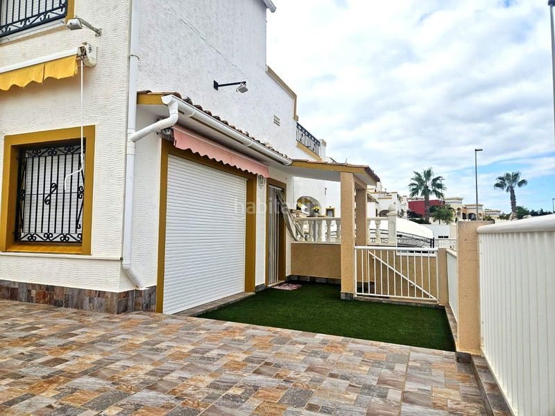 Foto 1f0fd519-35f7-442b-832f-794f7f763fe1. Casa aparellada amb aparcament piscina a La Florida Orihuela