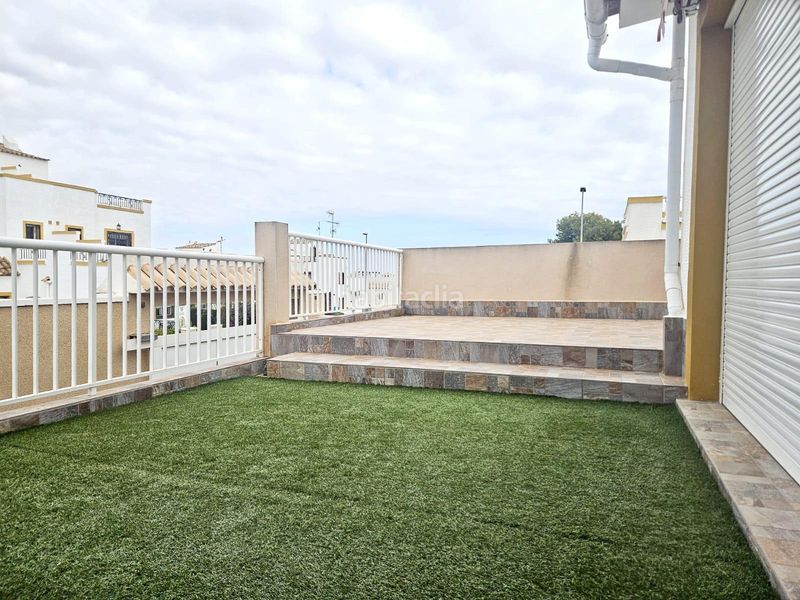 Foto 5da68aaf-7906-4e53-afbf-f6460780a113. Casa aparellada amb aparcament piscina a La Florida Orihuela