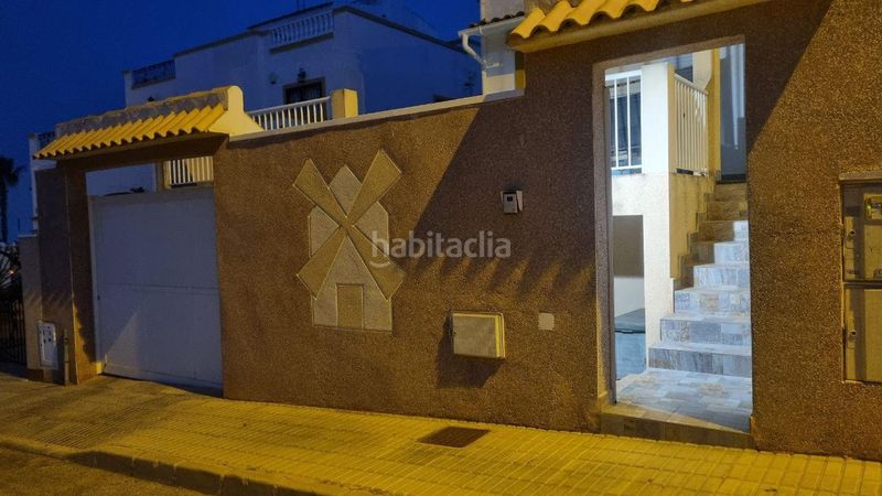 Foto c54248a0-9619-4bf9-bbcf-aa68cb2f8795. Casa aparellada amb aparcament piscina a La Florida Orihuela