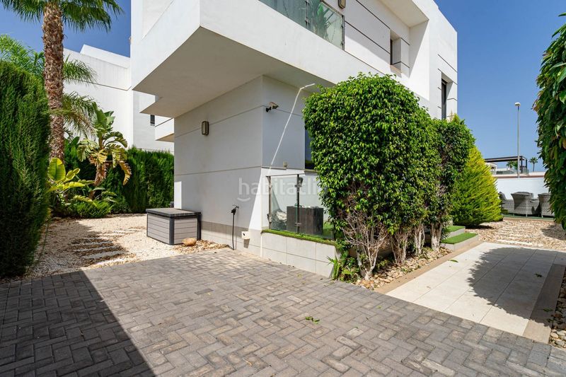 Foto c7f5efb7-7fa1-4cfe-ac81-d4ad2299b32c. Chalet with parking pool in Lo Marabú Rojales