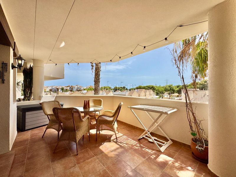 Foto 5ca2e1b1-6d4b-4eca-88c6-35facdf9316e. Apartament amb aparcament piscina a Punta Prima Torrevieja