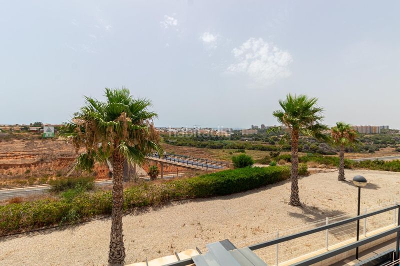 Foto e4c5fb7e-de83-4840-86a9-24db5784cb37. Casa a schiera con parcheggio piscina in Lomas de Cabo Roig - Los Dolses Orihuela