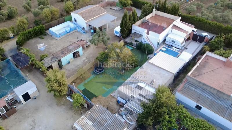 Foto a7015f5f-ec52-4d0a-85bd-280ab87642bf. Masía parcela rústica en urbanización las mesas en Utrera