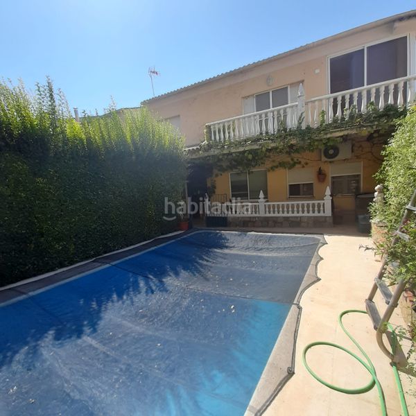 Foto a7adcd50-ef81-4475-8e6f-3f4396c0937a. Casa adossada amb xemeneia aparcament piscina a Úbeda