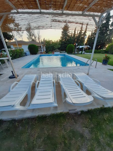 Foto b6052b27-3217-4f59-ac21-beac5931ee6b. Xalet amb xemeneia aparcament piscina a Úbeda