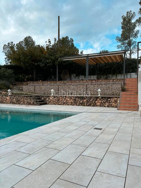 Foto e109848b-0b6d-4fe3-b5c9-c5e4fcd93349. Chalet  con piscina en Llers