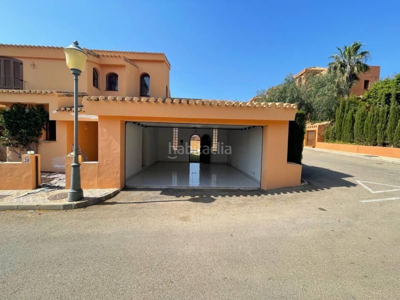 Foto 13b36396-fbc9-4119-ba16-f4be79597b44. Casa adossada amb aparcament piscina a La Manga Club Cartagena