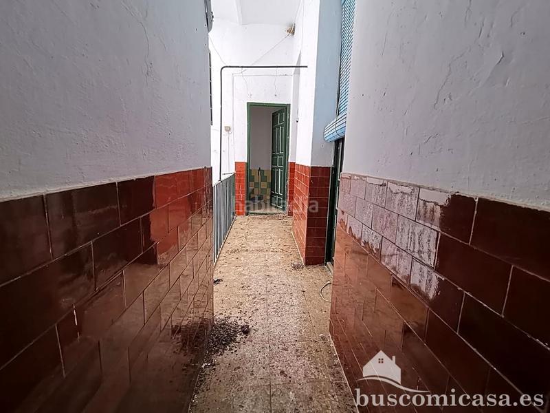 Foto ca6ff1e3-80e1-49c1-8911-7e8a47105fe2. Casa aparellada a Centro ciudad Linares