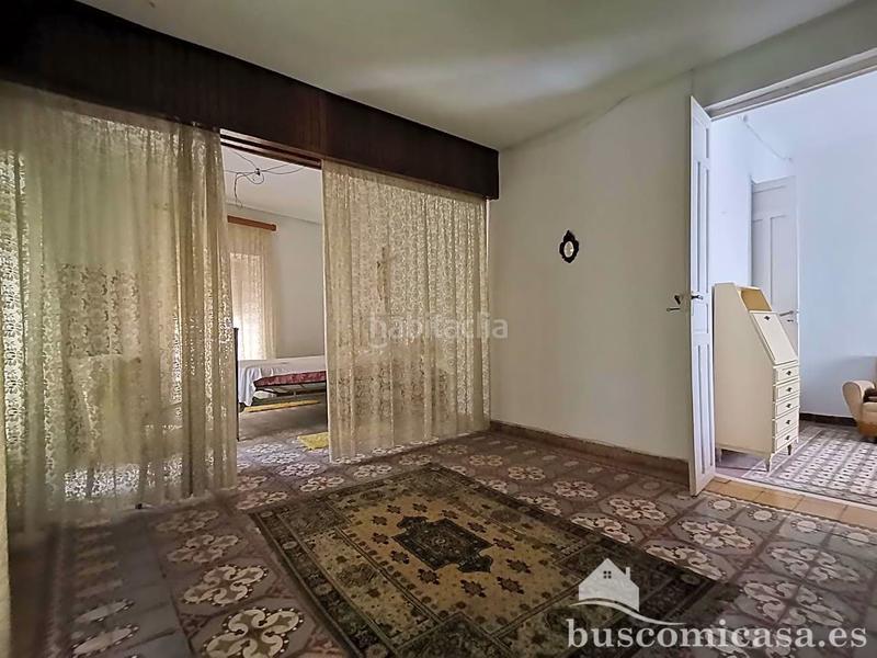 Foto cb9d41c2-2bd1-48f8-9e27-f2b778214c16. Casa aparellada a Centro ciudad Linares