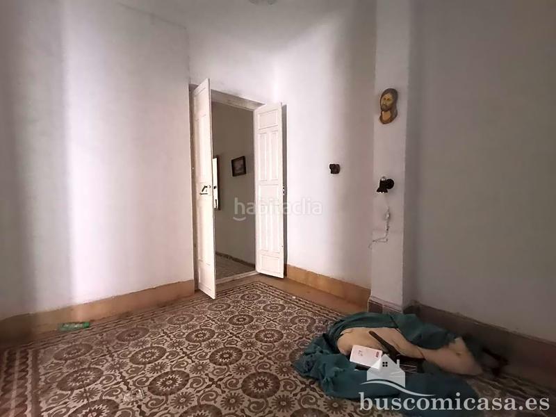 Foto d7b6ea26-98f9-4847-a3df-d10b51c16212. Casa aparellada a Centro ciudad Linares