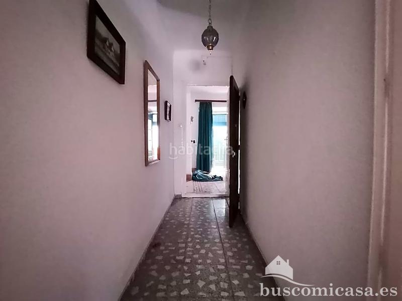 Foto f6076530-d11f-4433-b53e-6c49ee77342e. Casa aparellada a Centro ciudad Linares