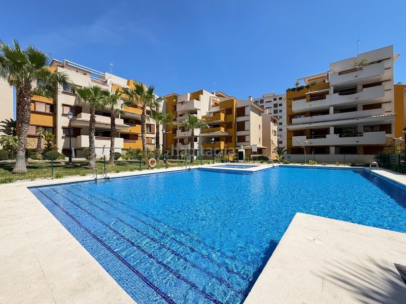 Foto 54d36fbf-2934-499f-aeca-4c21ee6a30db. Appartement mit heizung parking pool in Punta Prima Torrevieja