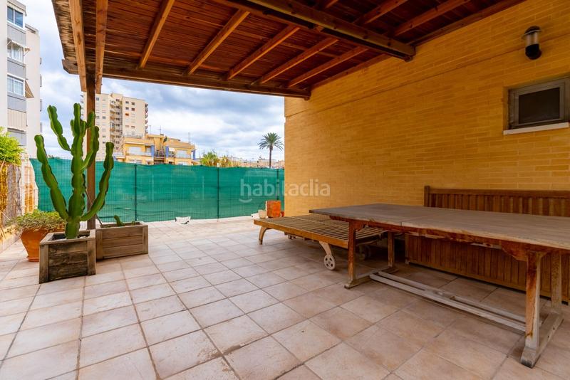 Foto 26f28352-6ebc-40a9-bd05-247d224c1f7a. Planta baja excelente apartamento en planta baja con parcela propia a 100 pasos del mar en Campello (el)