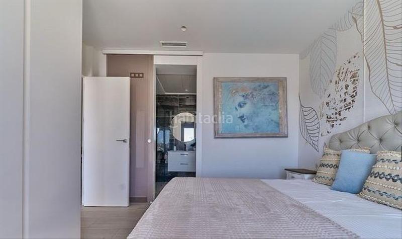 Foto 797000ed-4972-4bb5-bb15-5b6ba94640a4. Towny house with heating parking pool in balcón de Finestrat-terra marina Finestrat