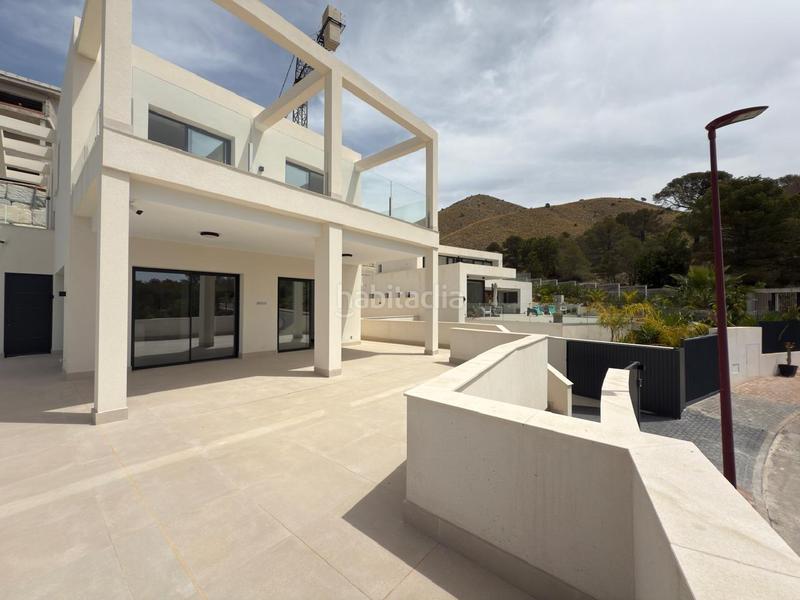 Foto 0e7e3702-7d30-4acd-ba83-52f5d36800fa. Chalet avec chauffage parking piscine dans Golf Bahía Finestrat