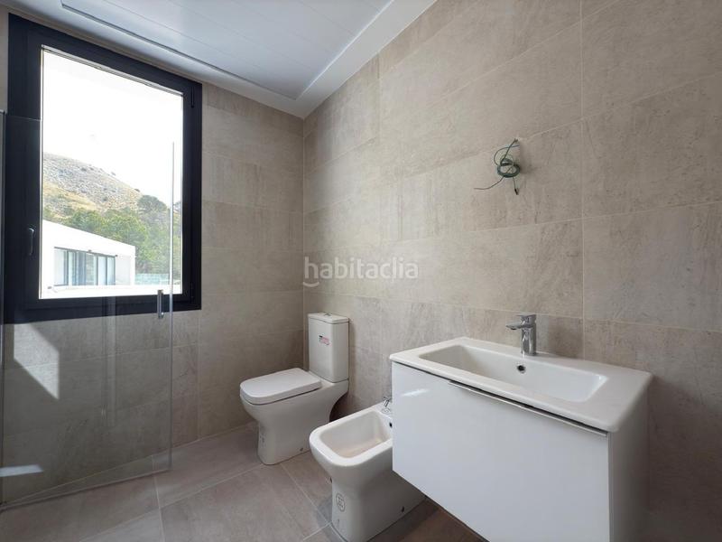 Foto 321dd45d-3dde-49a4-aea2-896dd85912c1. Chalet avec chauffage parking piscine dans Golf Bahía Finestrat