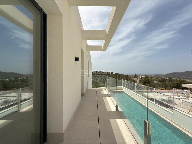 Foto 3794ba0f-a935-47f5-8b0b-f2ffed35ddb1. Chalet avec chauffage parking piscine dans Golf Bahía Finestrat