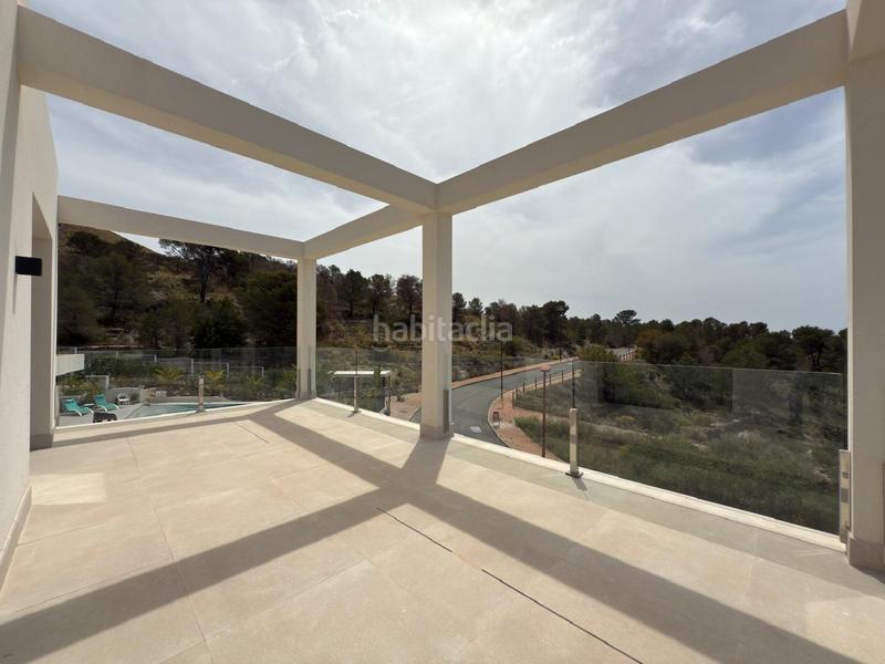 Foto 54ef03af-8efa-4d8d-a802-30a6f62701b1. Chalet avec chauffage parking piscine dans Golf Bahía Finestrat