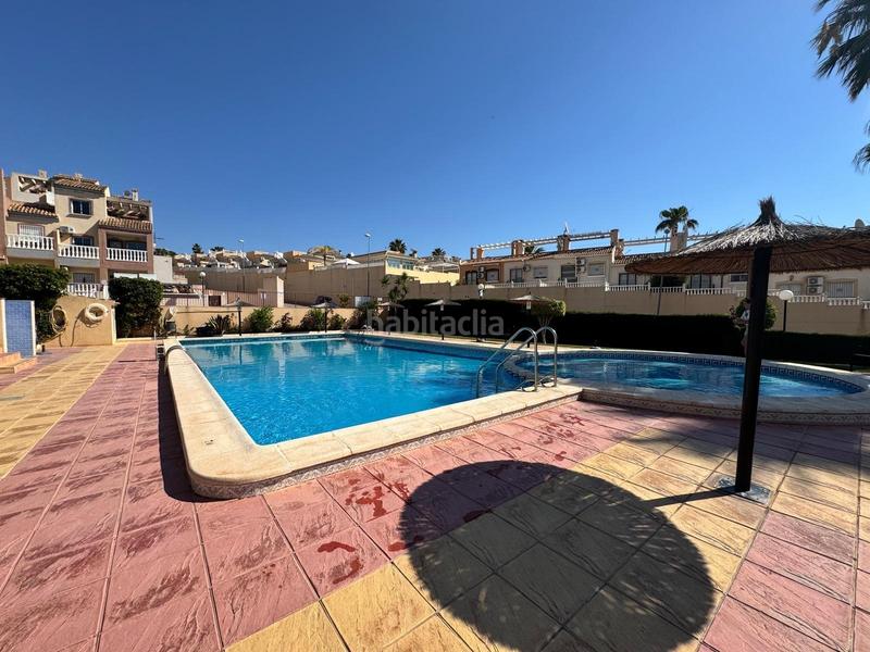 Foto 15d6fe18-0df2-463a-985c-65cc8dbe1406. Semi detached house with parking pool in Villamartín-Las Filipinas Orihuela