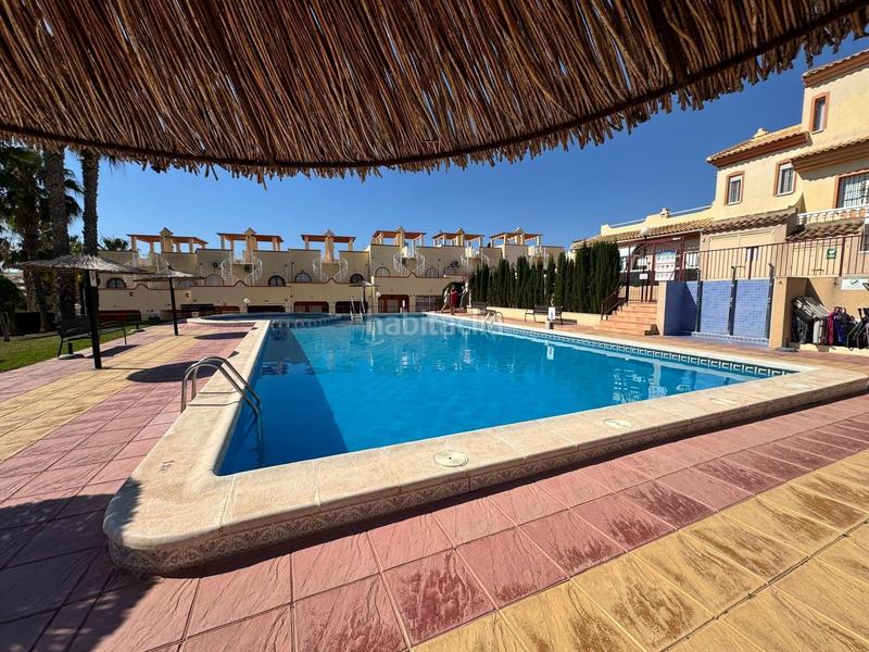 Foto 338353a4-3169-4e2f-848b-d39ee28587ec. Semi detached house with parking pool in Villamartín-Las Filipinas Orihuela